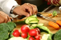 fotolia 2206111Chef cutting vegetables